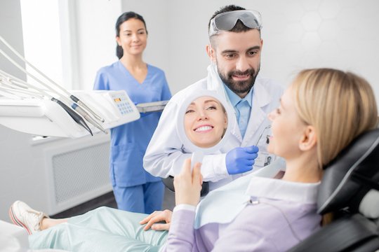 Patient receiving gentle dental care